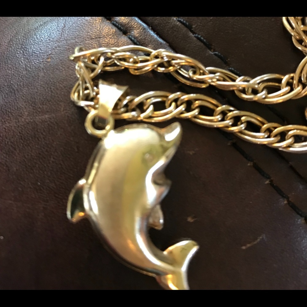 14 Kt gold fish pendant